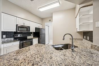 Granite kitchen countertops at verona at boynton beach apartments in boynton beach, fl 33426